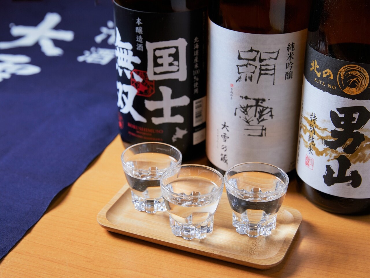 日本酒試飲コーナー：間限定で旭川の銘酒を楽しめる試飲コーナーをフリースペースでご用意しております。